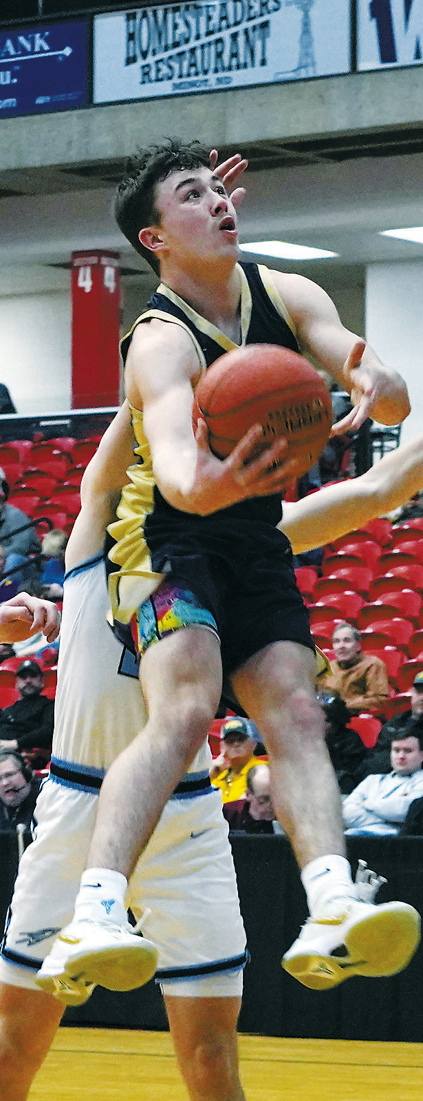 Brody Berg was Player of the Game against the NRS and finished the match with 9 points and six rebounds. Photo by Larry Stokke.