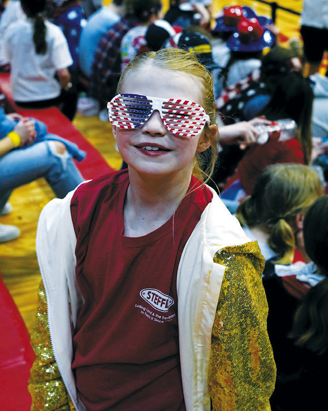 A young Eagles fan cheering on her team. Photo by Larry Stokke.