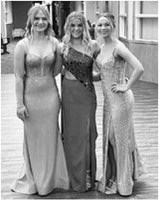 From left to right: Kate Bjornstad, Caylee Berg, and Jenna Fraser in their beautiful prom dresses. Submitted photo.