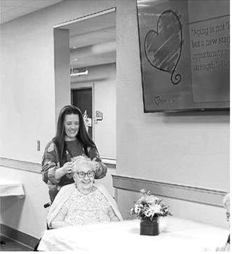 Kelsy crowns Queen Gerry. Submitted photo