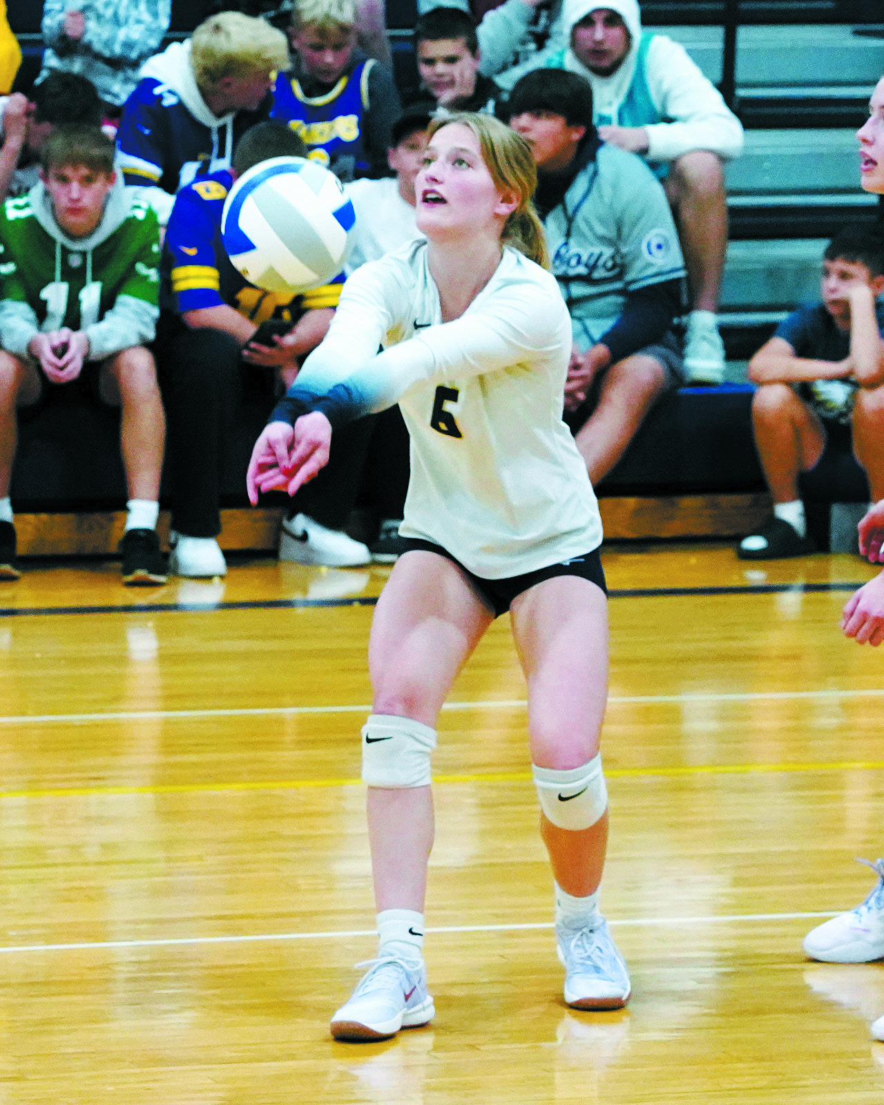 Dannika Bennett with a dig in the Eagles game against Cavalier. Photo by Larry Stokke.