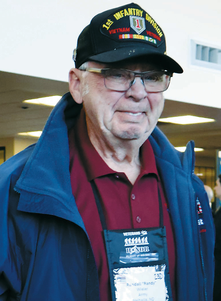 Randy Wieler of Walhalla arriving home from the Honor Flight. Photo by Rebecca Davis.
