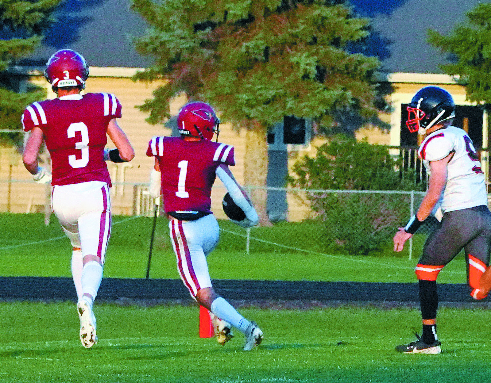 Jayden Lee scores on a 5-yard run for the second touchdown of the Homecoming Game against Rugby. Photo by Larry Stokke.
