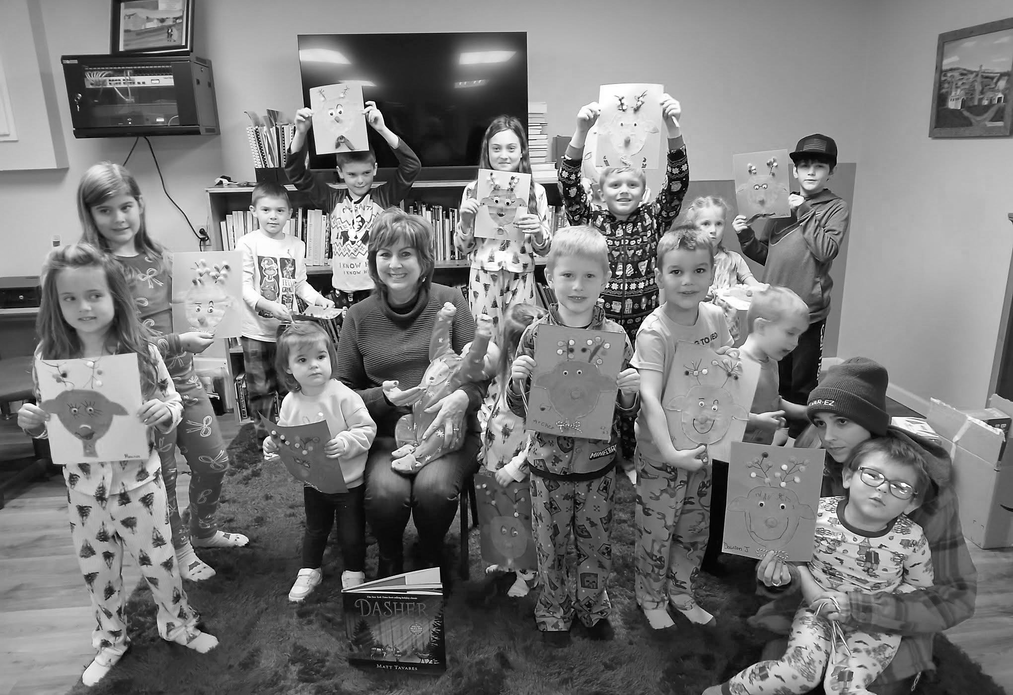 This week was a wonderful story about Dasher, the reindeer. Joan Chaput did a great job with the kids. They made reindeer out of construction paper, and they had cupcakes from Michelle for snack. Thank you, ladies, it was a great turnout. Photo by Deb Brusseau.