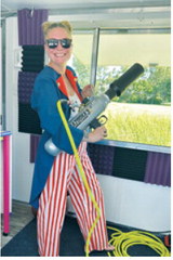 Chamber President Courtney Krom readies the T-shirt cannon before launching prizes into the crowd during the Pre-Blast Bash celebration. Submitted photo