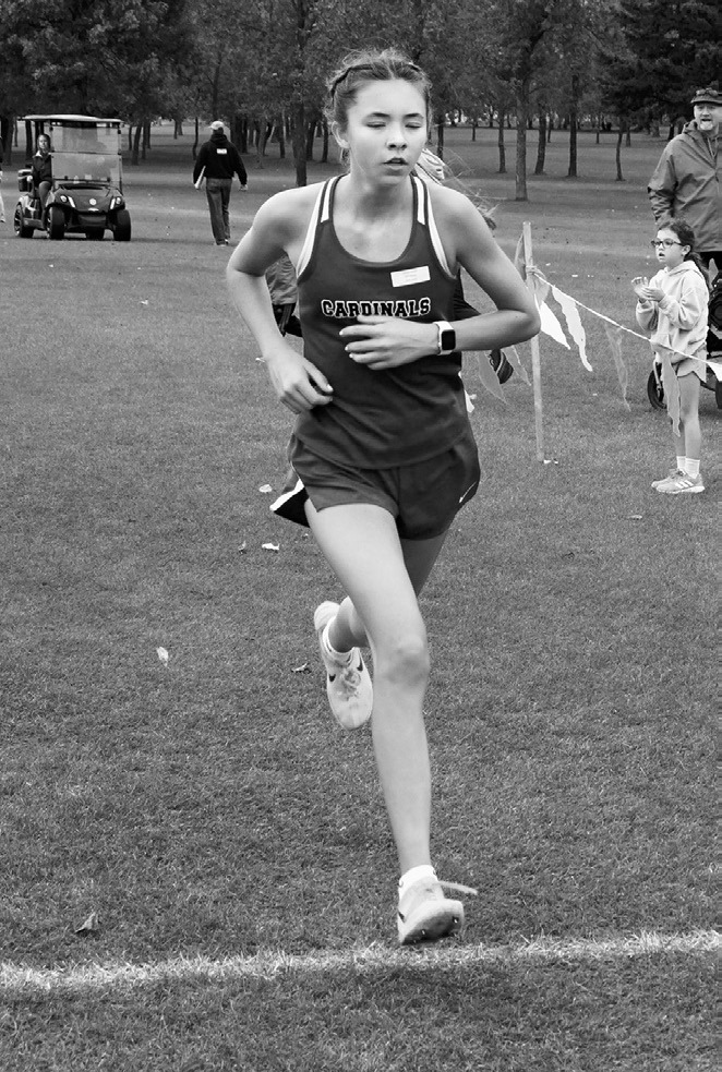 Olivia Lorenz took first place in the varsity girls race with a time of 20.52.09. Photo by Larry Stokke.