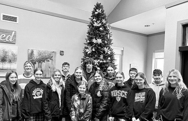 Student Council members at Pembilier Nursing Center helping with decorations.