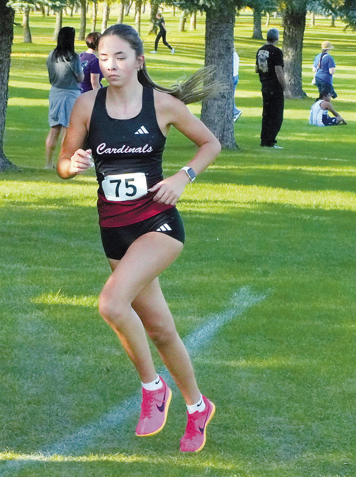 Olivia Lorenz ran to a 10th place finish with a time of 22:59.51 at the Harvey Hope Invitational. Photo by Larry Stokke.