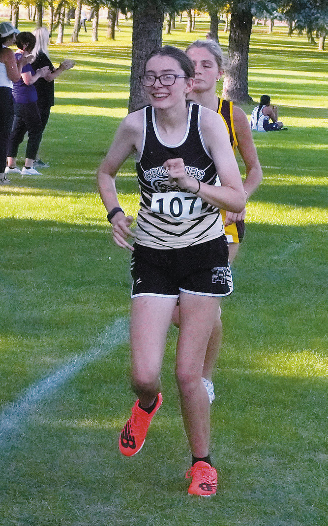 Maddy Robinson finished 11th at the cross country meet in Langdon. Photo by Larry Stokke.