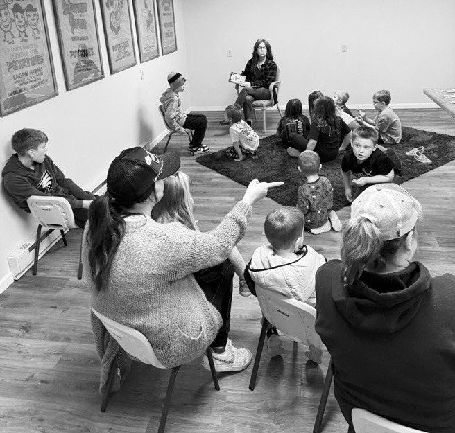 Carol Clark reading during story hour last week.