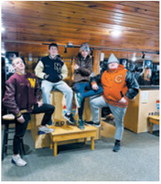 The Frost Fire team shows up for 80s day on the slopes.