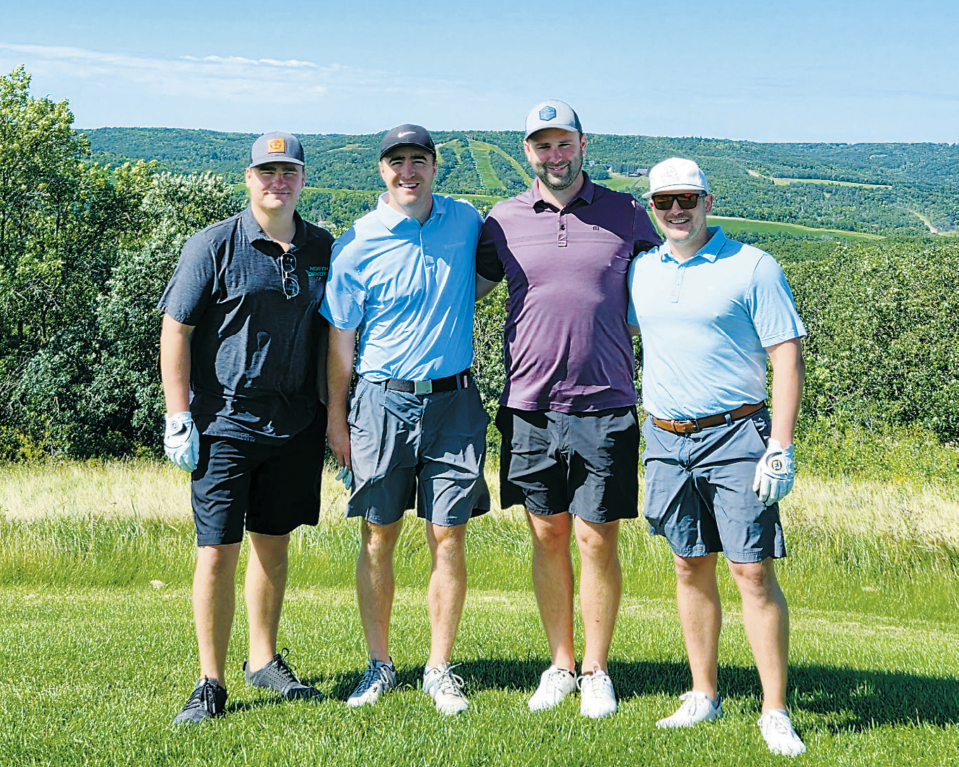 The winning team of Frost Fire's second annual golf tournament fundraiser (L-R) Andy Norman, Ross Johnson, Blaine Johnson, and Casey Fugleberg. Photo by Julie Regner.