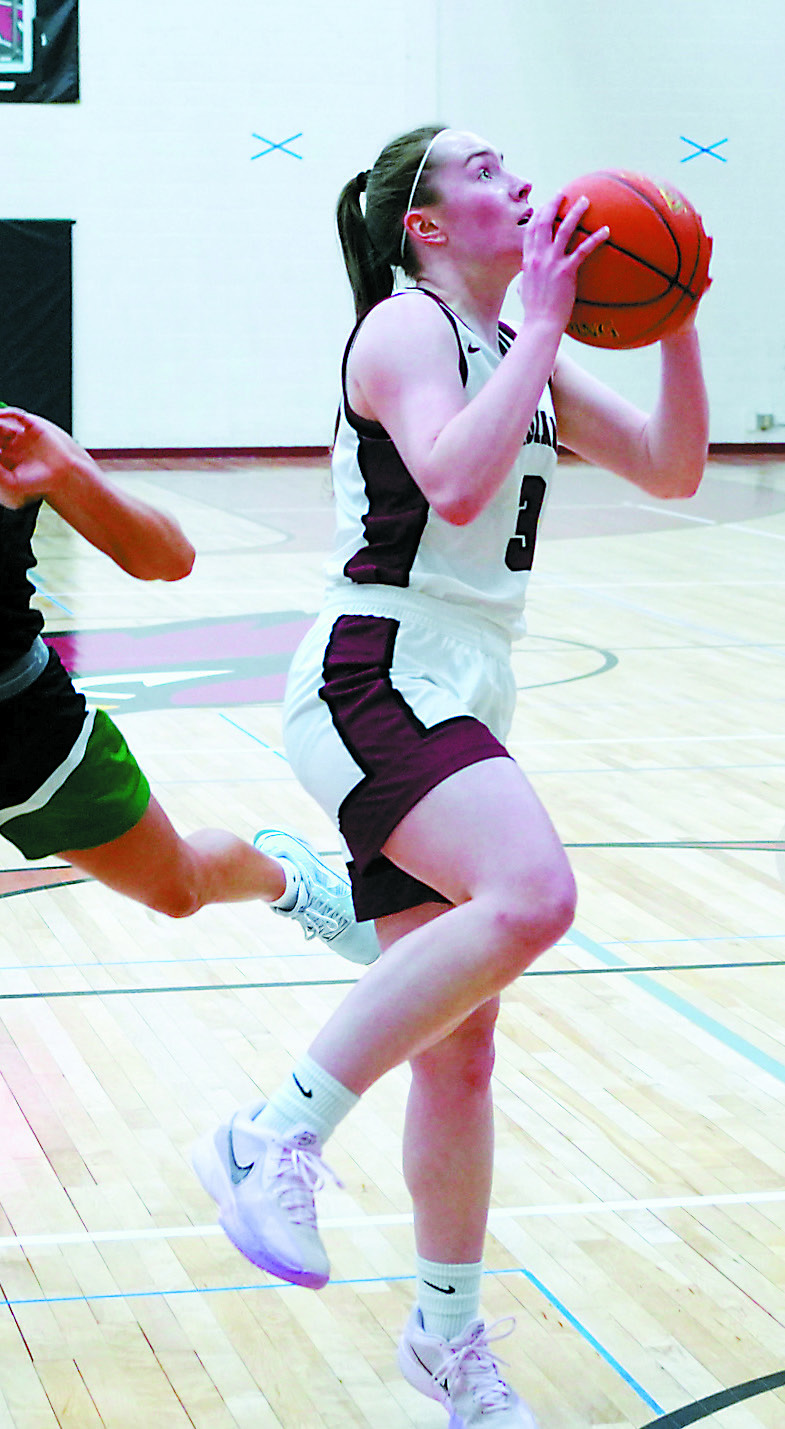 Merideth Romfo was player of the game against Thompson, finishing with 21 points. Photo by Larry Stokke.