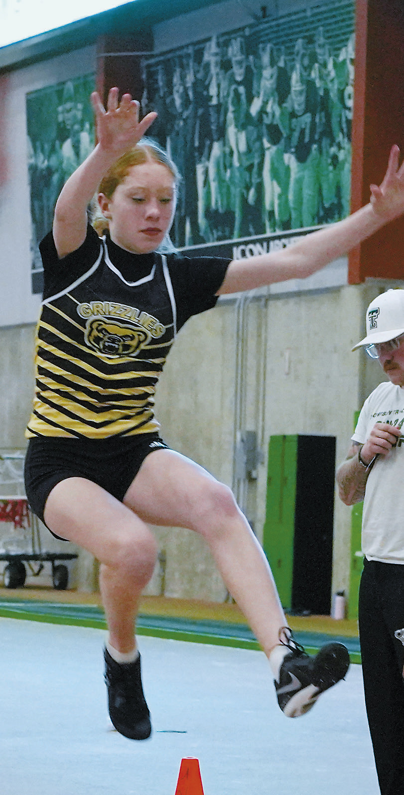 Gracelyn Moe leaped to a personal best of 13'4' in the long jump. Photo by Larry Stokke.