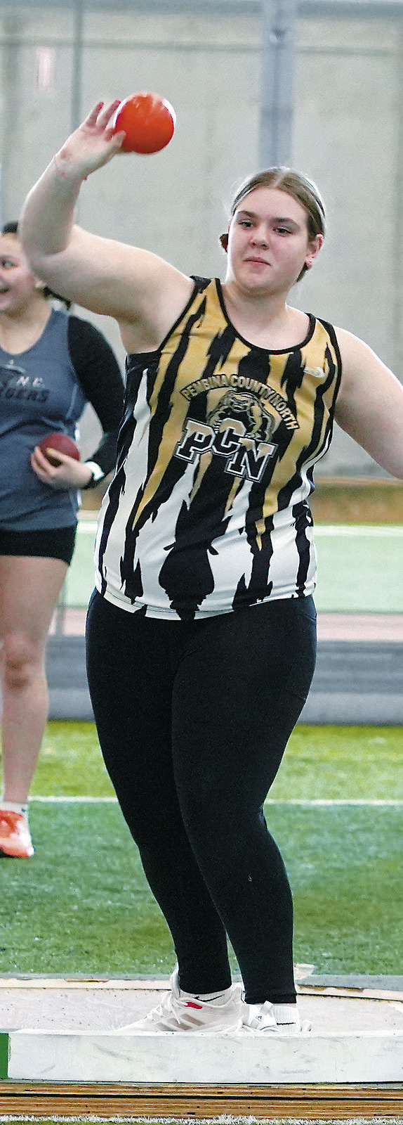 Lianda Jacobs threw the shot put for a personal best of 22' 7.5' at the Red River Valley Meet in Grand Forks on April 4. Photo by Larry Stokke.