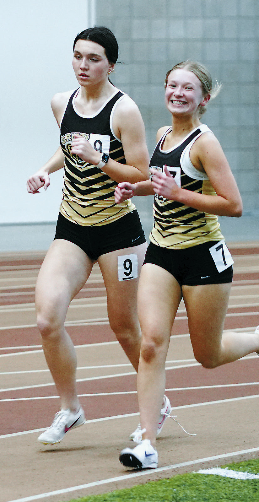 Emerson Helgoe and Delaney Denault placed 7th and 9th in the 1500 meter run. Photo by Larry Stokke.