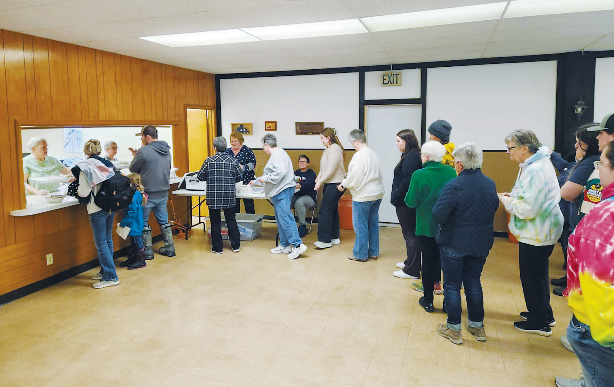 Folks like up after bingo to grab their loaded baked potatoes. Photo by Hilary Nowatzki.