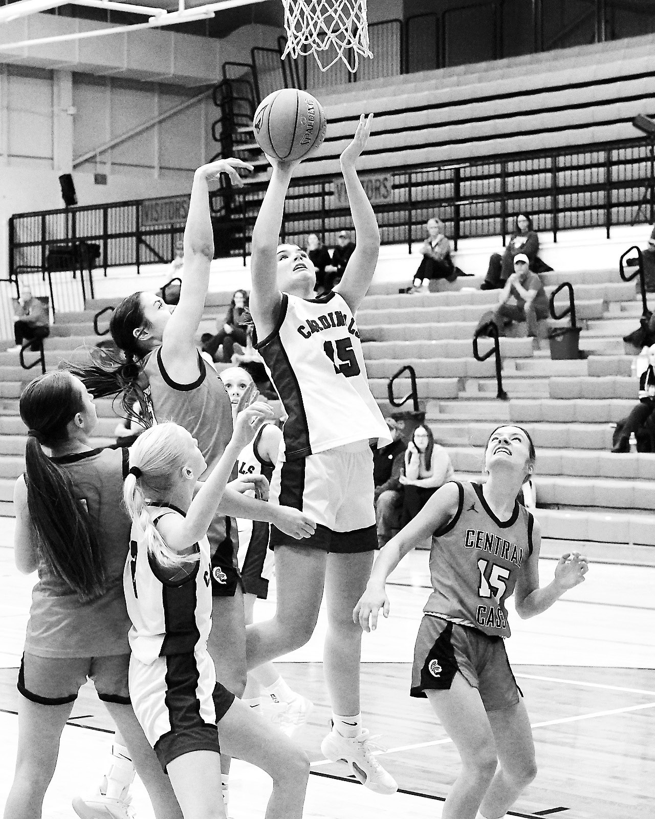 Lady Cards split two non-conference games to start new season