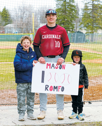 Mason Romfo got his 100th hit of his high school career against Midway-Minto this week. Photo by Larry Stokke.