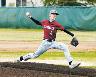 Tyson Gemmill fires one of his strikes against Midway-Minto. Photo by Larry Stokke.
