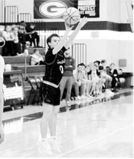 Connor Mitchell was Player of the Game in the game against Grafton. Connor nailed 4 three-point baskets to lead the Cards with 12 points. Photo by Larry Stokke