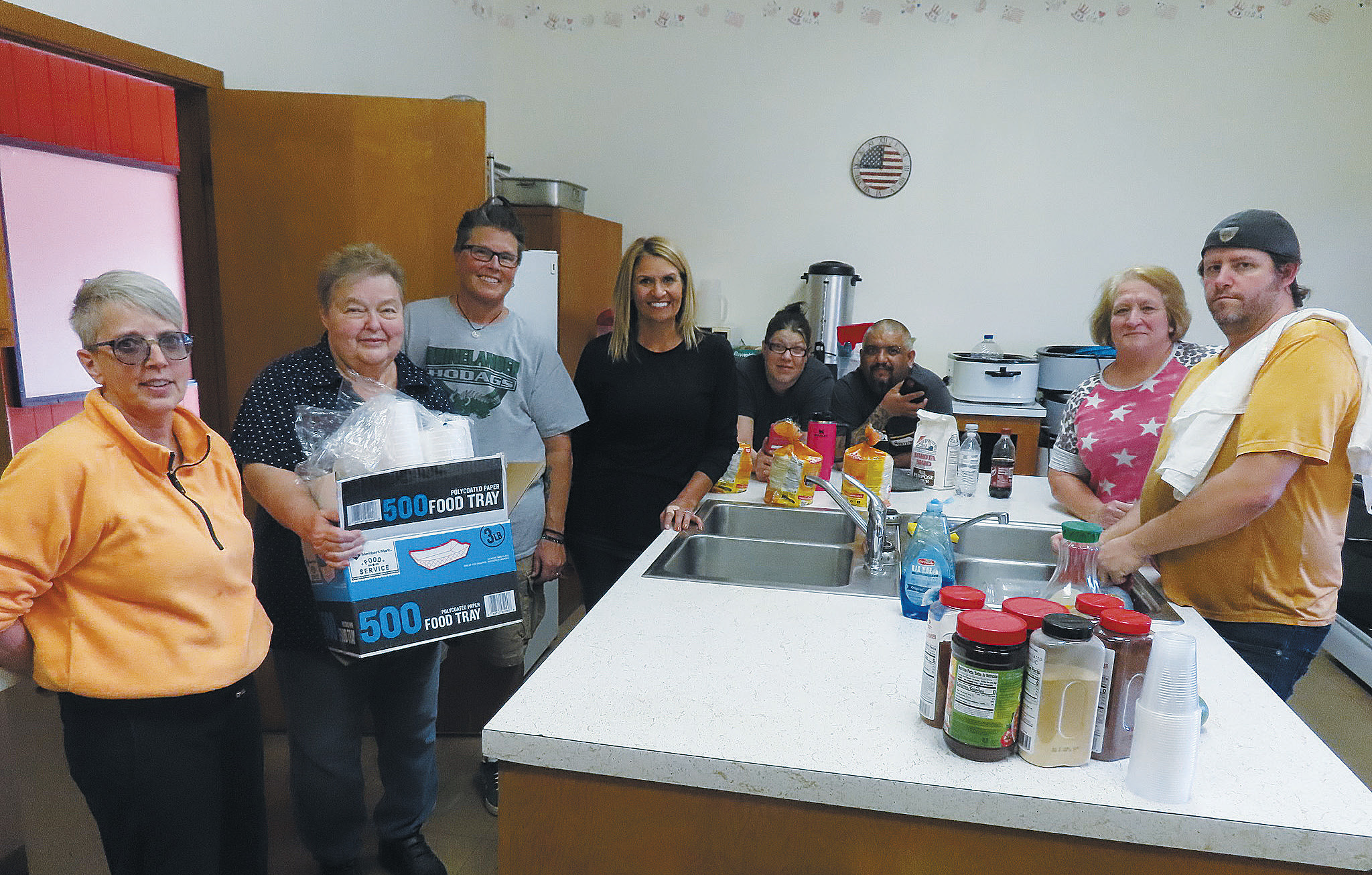 Pictured are Cheryl Trupe, Sarah Brooks, Teirney Dunnigan, LaRae Horgan, Jesse Lipsch, Nano Moreno, Kathy Kopf, and Lance Waters. Photo by Melanie Thornberg.