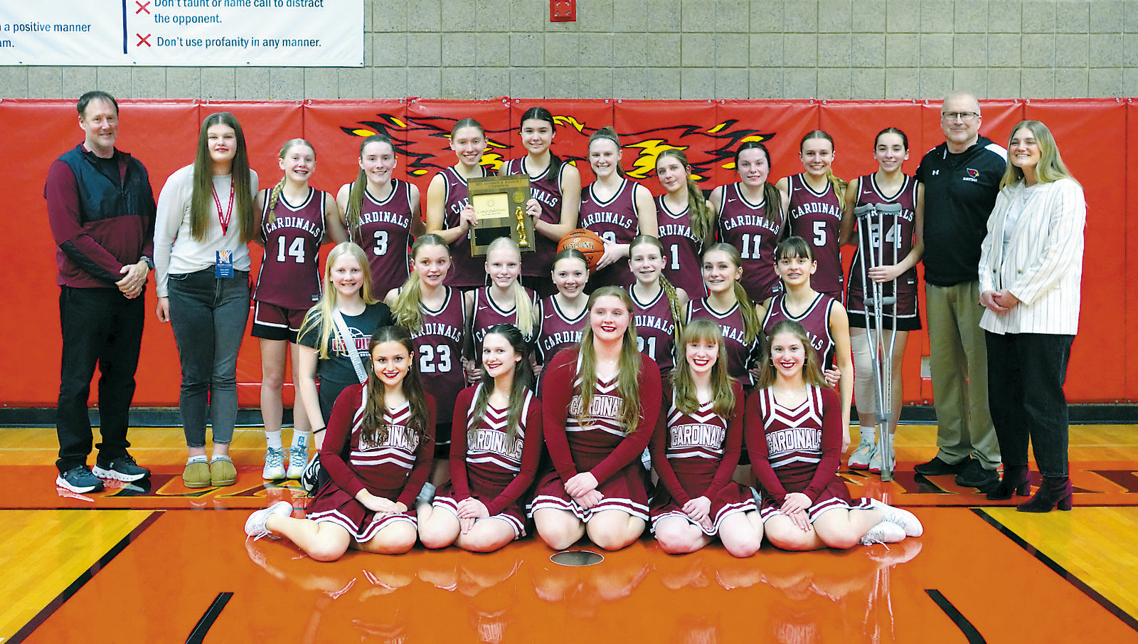 The Lady Cardinals Region 2B Championship team. Photo by Larry Stokke.