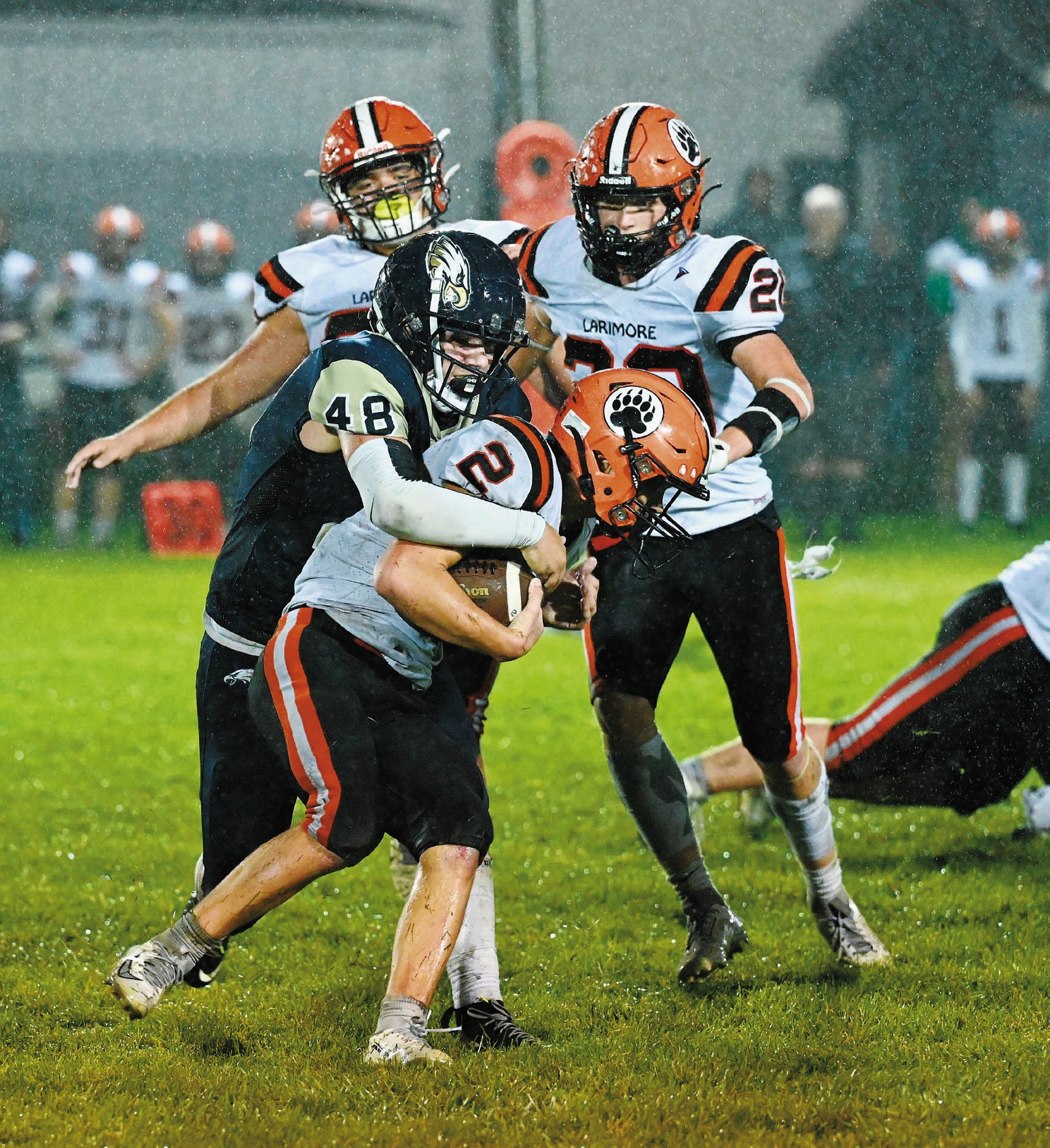 Chase Mensch steps up with a solid stop on the ball carrier. Photo by Ashley Schafer.