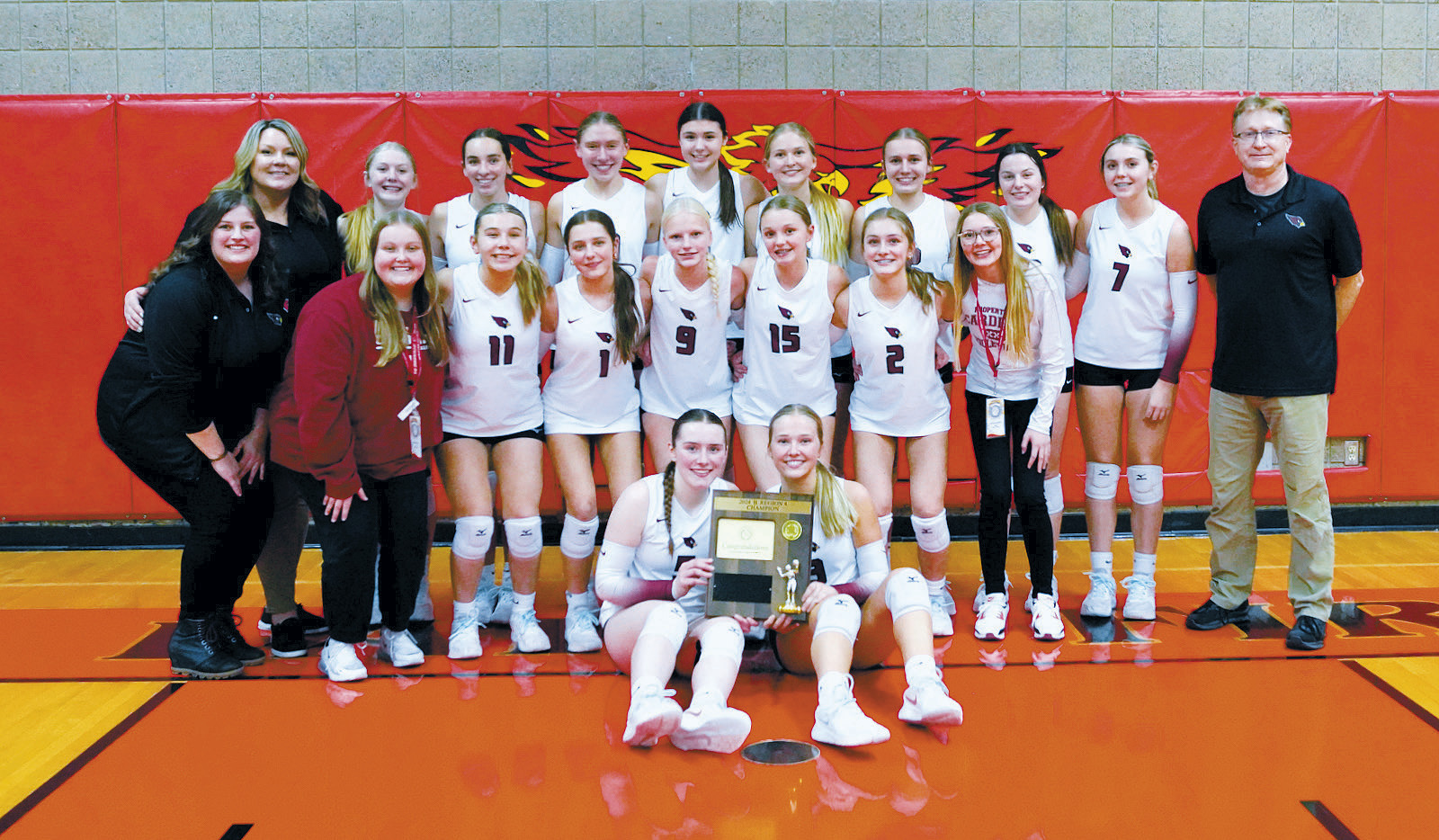 The Langdon-Munich Volleyball Cardinals and coaches. Photo by Larry Stokke.