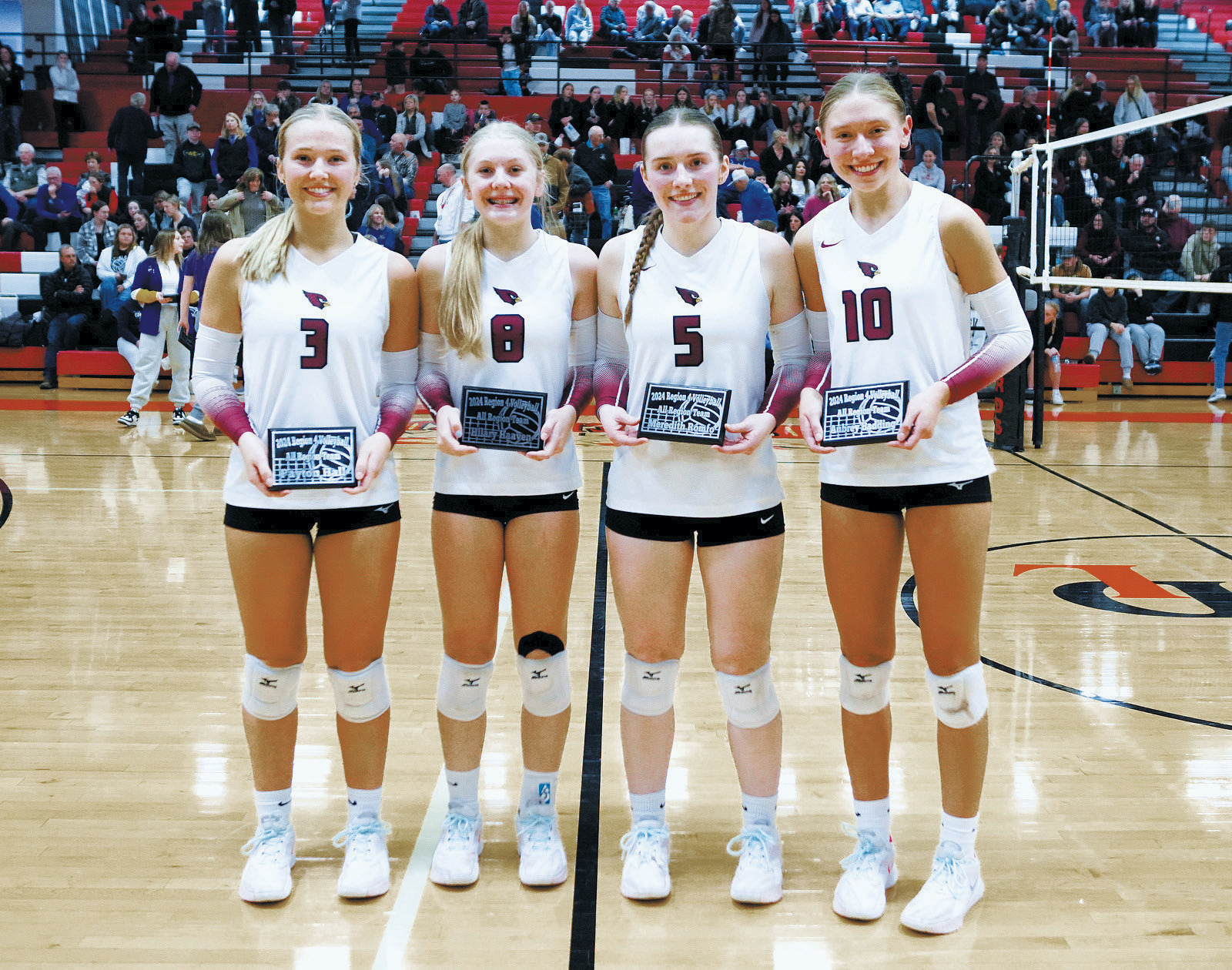 From (L-R) Payton Hall, Hilary Haaven, Meredith Romfo, and Aubrey Badding were named to the All Tournament Team. Photo by Larry Stokke.