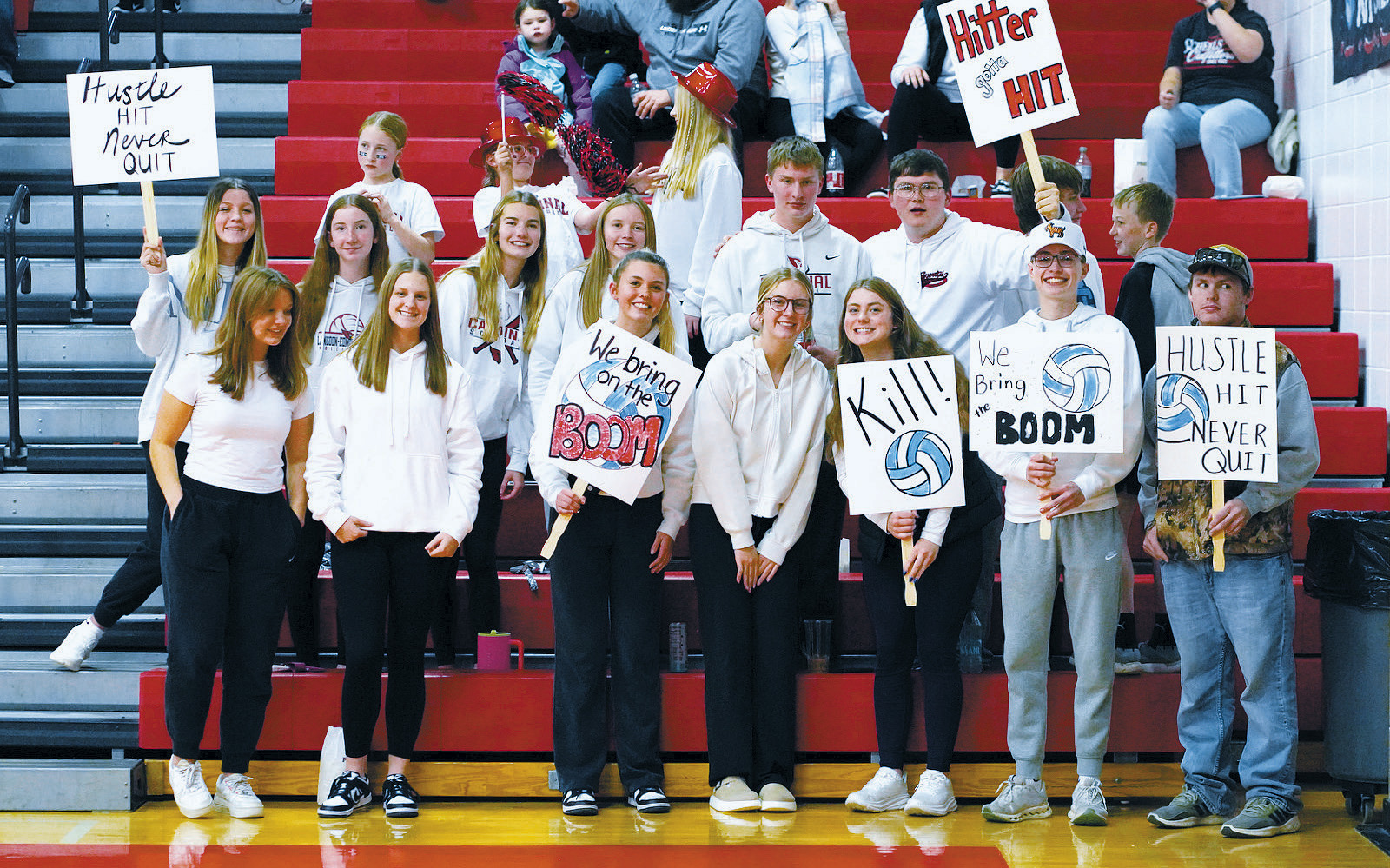 Cardinal fans cheer their team on in regionals on Nov. 12. Photo by Larry Stokke.