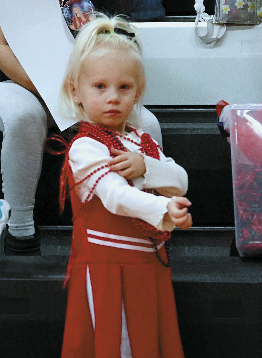 Future Cards cheerleader Daizie was dressed for the job and cheered on the Cards to a win. Photo by Larry Stokke.