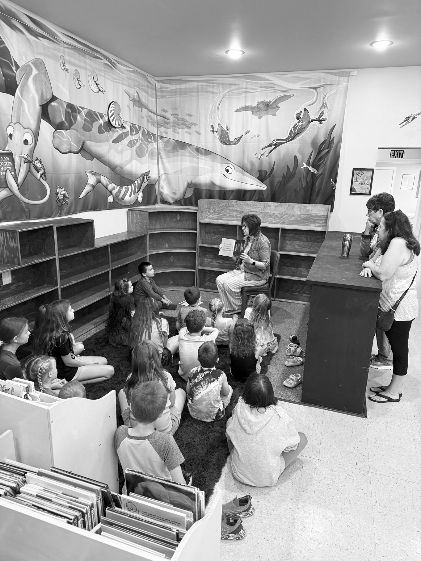 Joan Chaput read ‘A Coat of Many Colors’ and ‘Phiona the Flamingo’ to the kids for Story Hour.