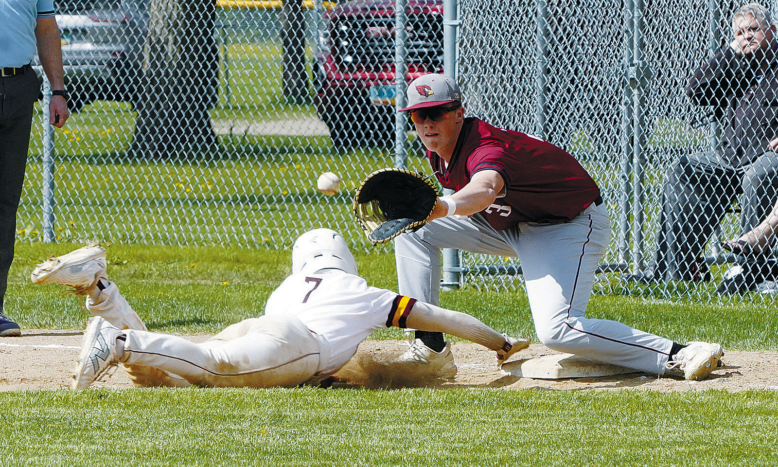 Dawson Hein with a really close call at first base to make the out against Grafton. Photo by Larry Stokke.