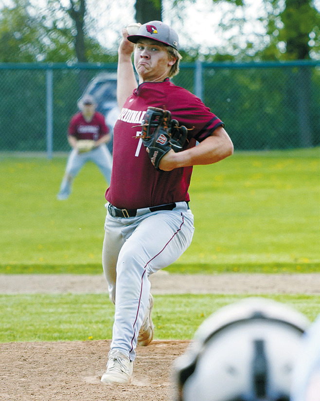 Theo Romfo eyes the zone and launches a strike. Photo by Larry Stokke.