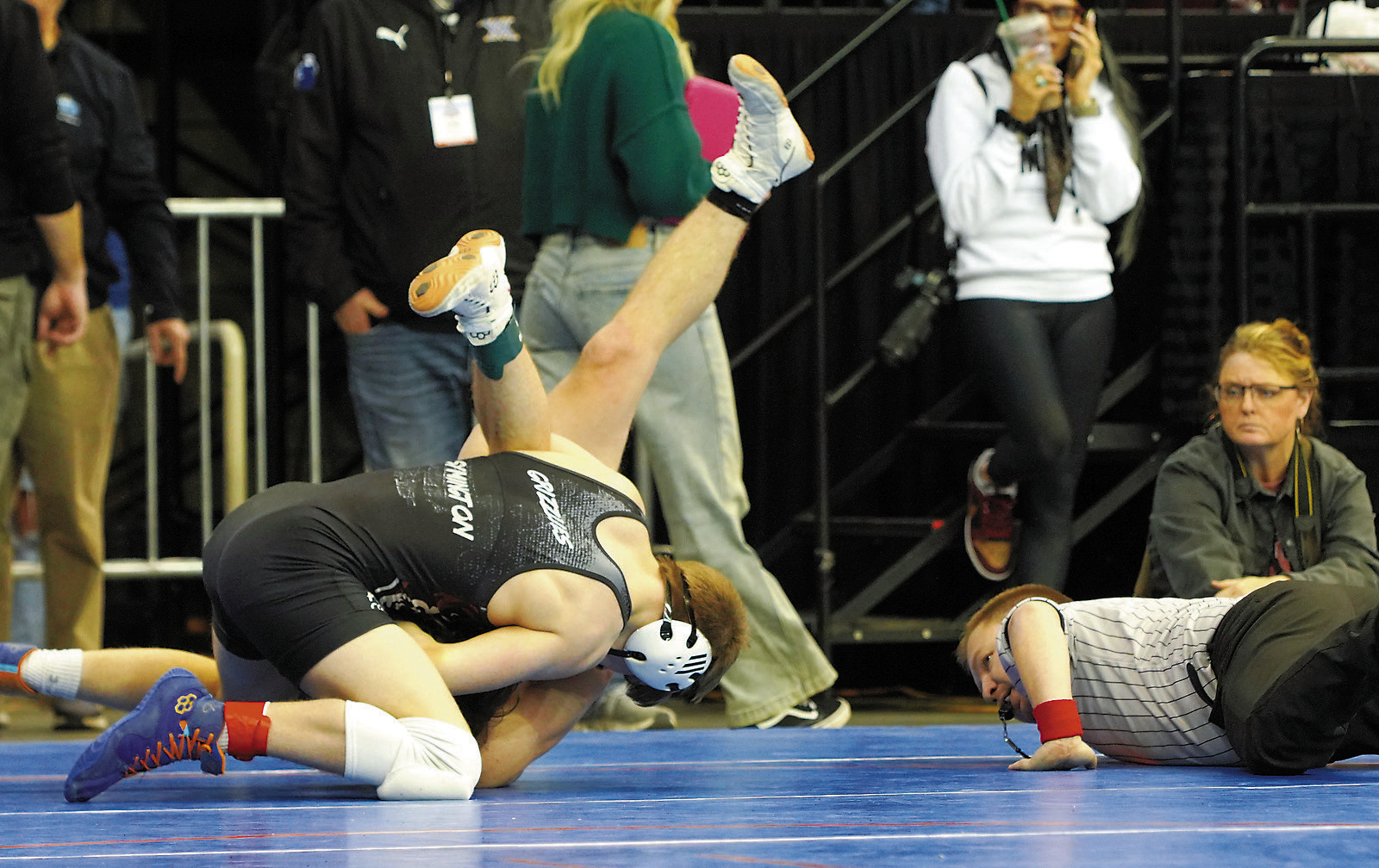 Zeke Symington wrestled his way to an 8th place finish at State by pinning his opponent in the 152 lbs. class. Photo by Larry Stokke.