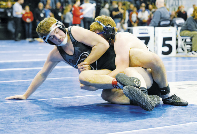Aiden Werner wrestled his man to a close decision loss in the 160 lbs. class. Photo by Larry Stokke.