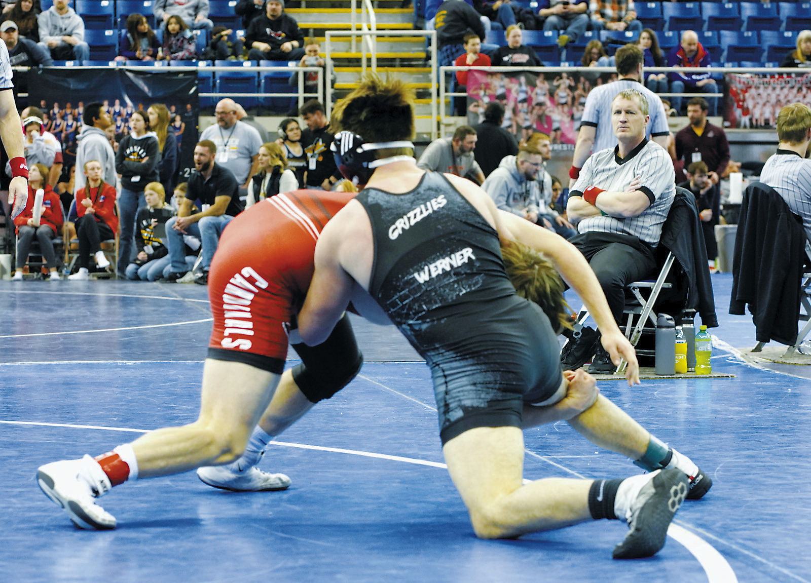 Aiden Werner ties up his opponent at state. Photo by Larry Stokke.