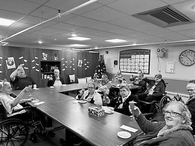 Residents toasting for New Years Eve.