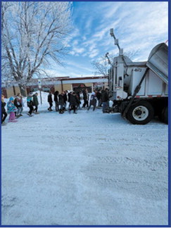 Students get up close to the snowplow. Submitted photo.