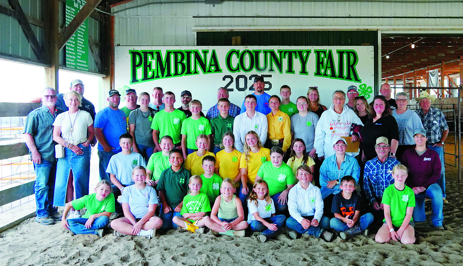 4H kids and the sponsors who bid on their animals that they raised. Photo by Larry Stokke.