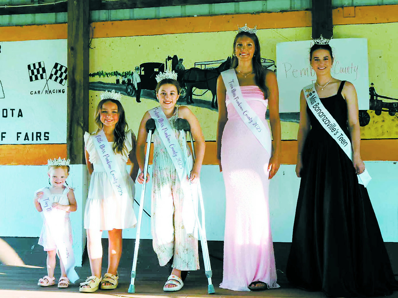 Miss Pembina County Fair Pageant Winners (L-R) Kyah Sharp (Tiny Miss), Aiden Lawonn (Little Miss), Isla Emerson (Preteen Miss), Jocelyn Anderson (Teen Miss) with Audrey Emerson (Miss Bonazaville's Teen). Photo by Rebecca Davis.