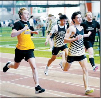 Boone Carrier placed 16th and Lance Santiago finished 24th in the 60-meter dash. Photo by Larry Stokke