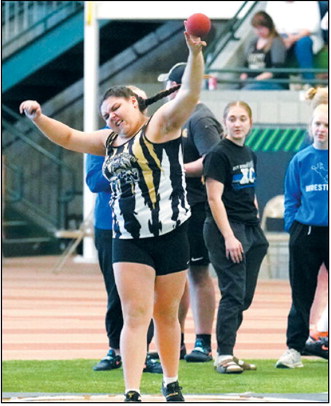 Zoie Lafferty placed 16th in the shot put at the Grand Forks meet. Photo by Larry Stokke