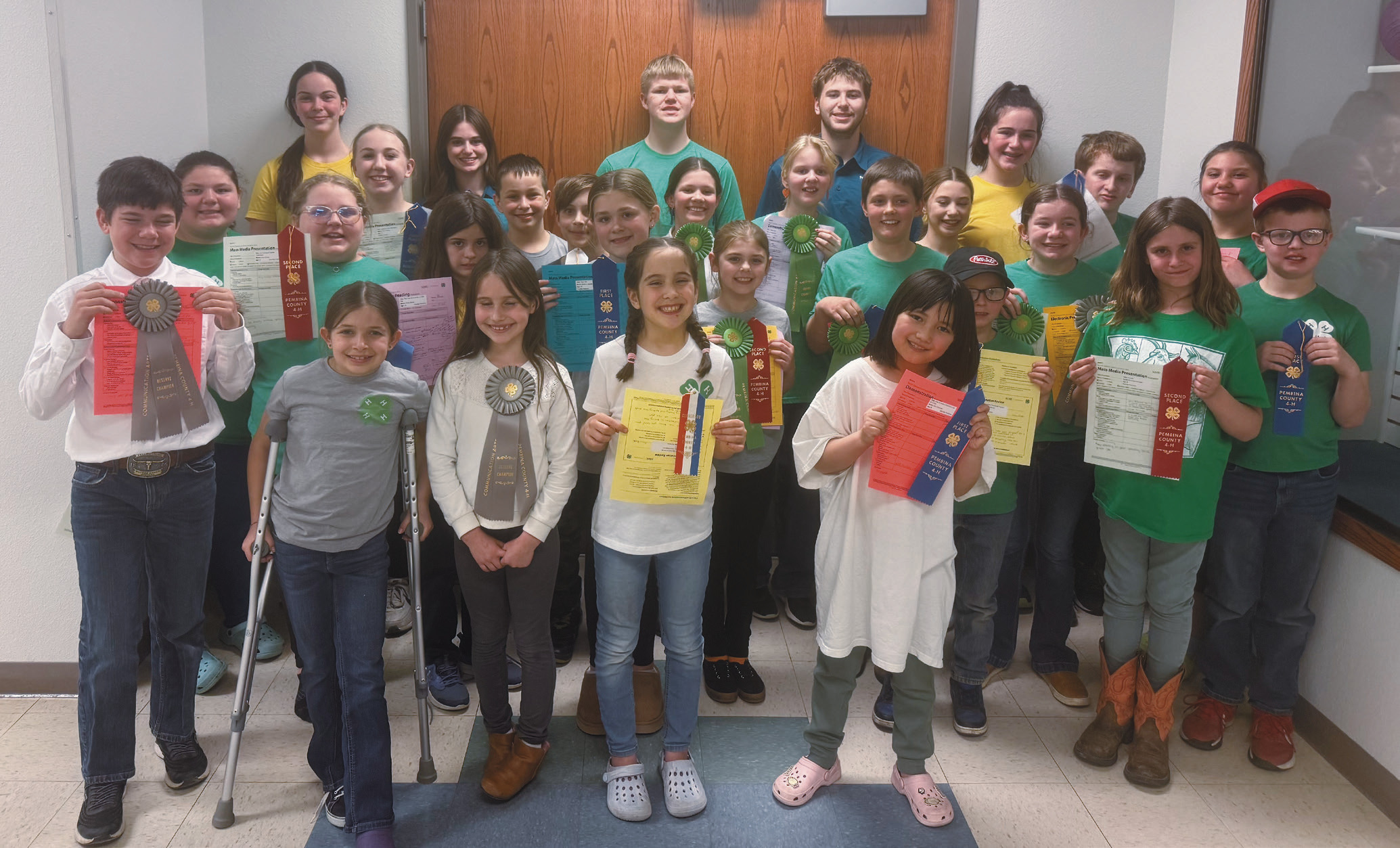 First row (L-R) Brinxlee Hay, Olive Truver, Elana Stegman, Aika Osowoski; second row: Colt Cruea, Melody Hubbard, Lainy Shane, Olivia Olimb, Mallory Latozke, Sadie Kennedy, Oscar Hunter, Silas Norrell, Adlee Hay, Penelope Johnson, Levi Norrell; third row: Pyper Shane, Nathan Stegman, George Alfred Truver, Chloe Hunter, Stella Norrell, Isla Emerson, Gary Olimb, Aurora Vernon; fourth row: Caroline Stegman, Audrey Emerson, Chaz Halverson, Preston Emerson, and Naomi Stegman.