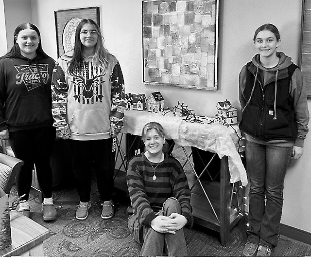 Georgia, Jaelyn, Gracyn, and Jenny take a break from their hard work to snap a photo.