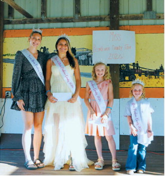 L-R: Jocelyn Anderson, 2025 Miss Pembina County Teen; Ellysiana Morin, Preteen Miss Pembina County Fair 2026; Aubree Johnson, Little Miss Pembina County Fair 2026; and Winter Moore, Tiny Miss Pembina County Fair 2026. Photo by Larry Stokke