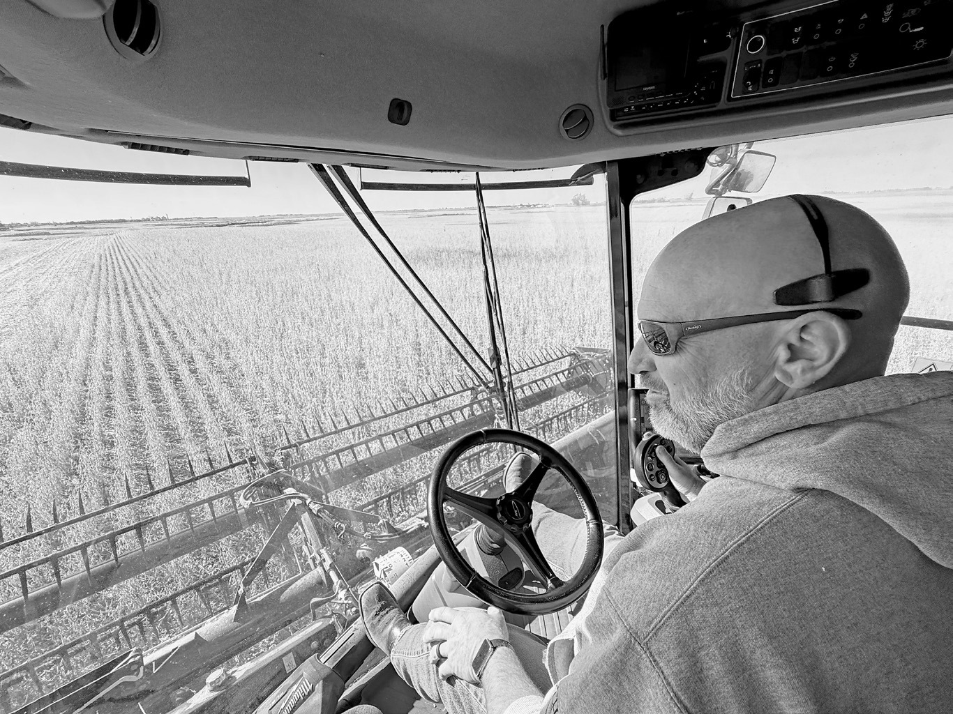 Colin Sundquist, Wyatt’s father, drives a grain cart while helping his son with harvest. Photo courtesy of Chris Aaruhs, North Dakota Farmers Union.