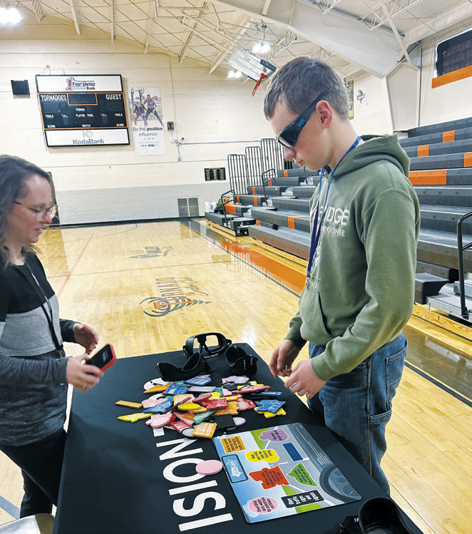 Students experimenting with the impaired goggles, which simulate different blood alcohol concentration levels that are used to vividly demonstrate the concept of impairment and dangers of impaired driving.