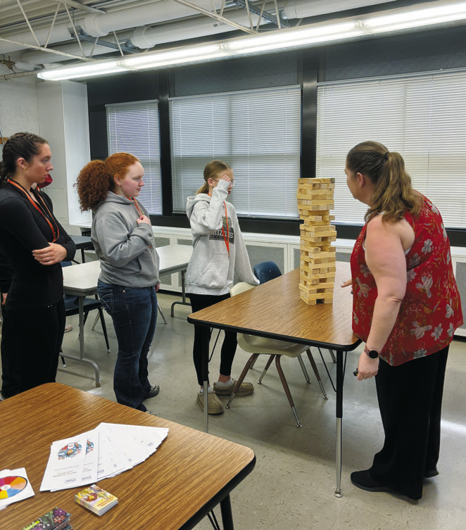 After reviewing the characteristics of a healthy and an unhealthy relationship, Krystal Bridwell from DVAC played an interactive game of Relationship Jenga with students.